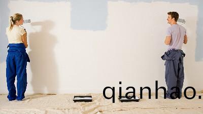 攝圖網_501483899_年輕伕婦粉刷(shua)牆壁（非企業商用）